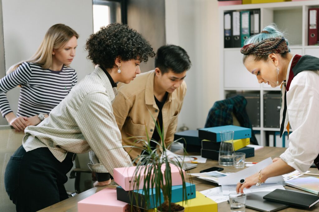 Direct marketing leader coaching team members and building strong workplace relationships through effective communication
