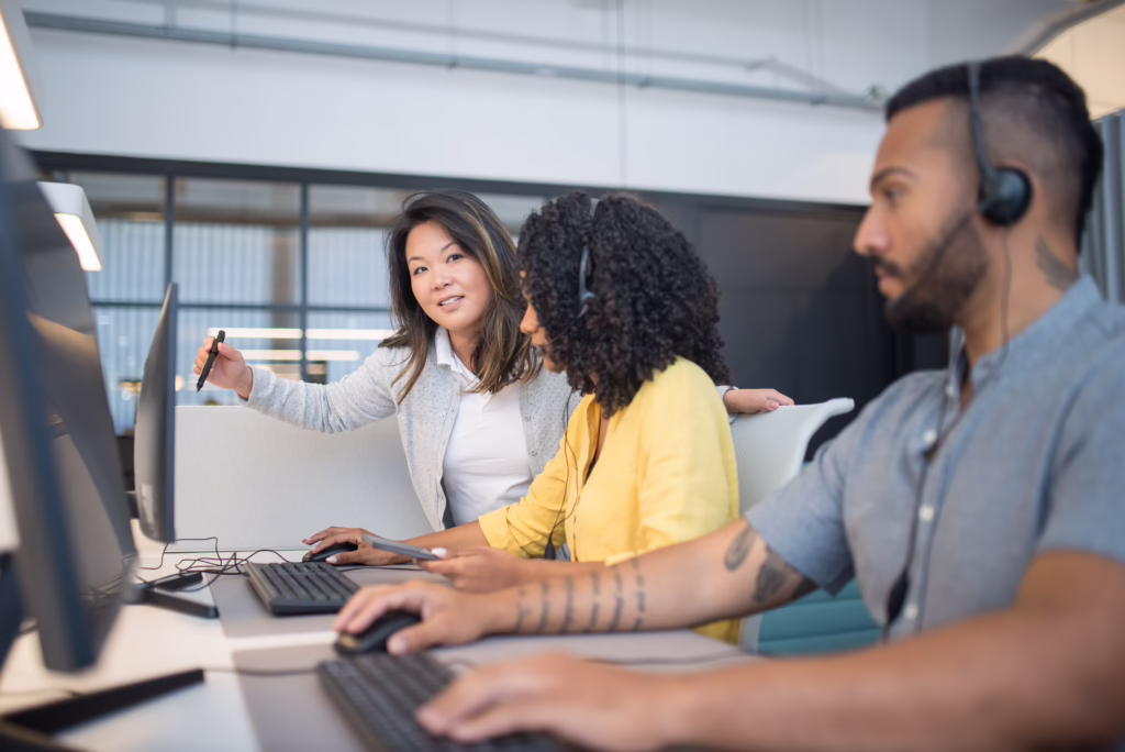 Team leader supporting employees through coaching, communication, and workplace wellness initiatives